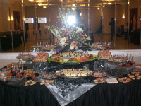 A fish table with lox, tuna, herring, gefilte fish, chrein, white fish